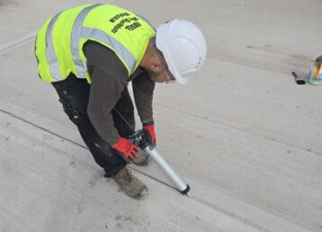 mastic sealant contractors applying sealant to carpark joints from ROSEAL company